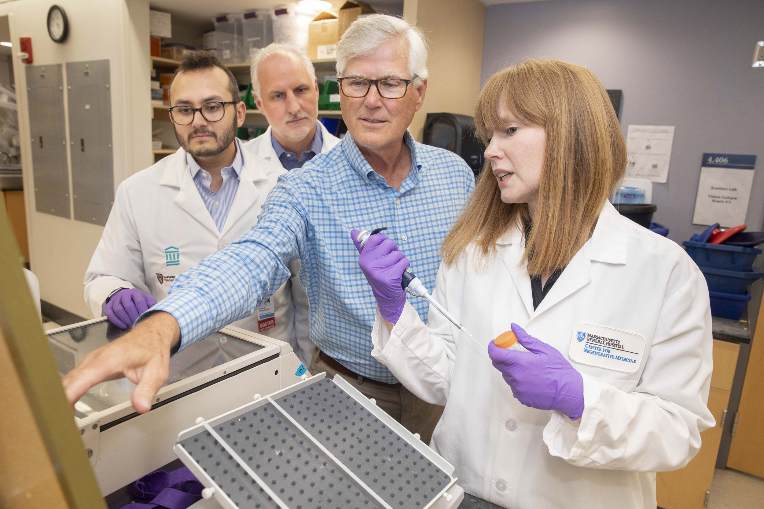 Researchers in lab.