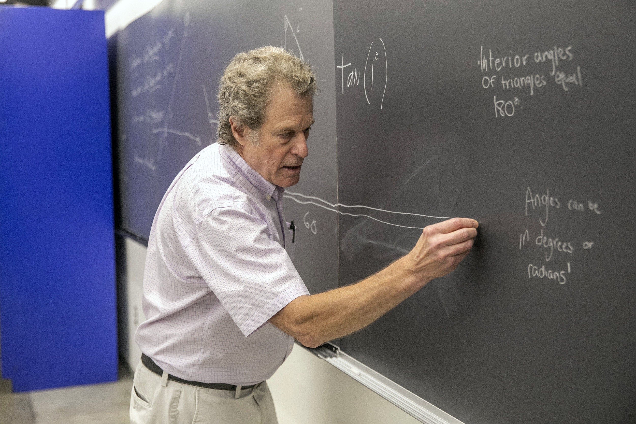 F.W. Wright Senior Lecturer in Astronomy Philip Sadler takes the helm at the chalkboard