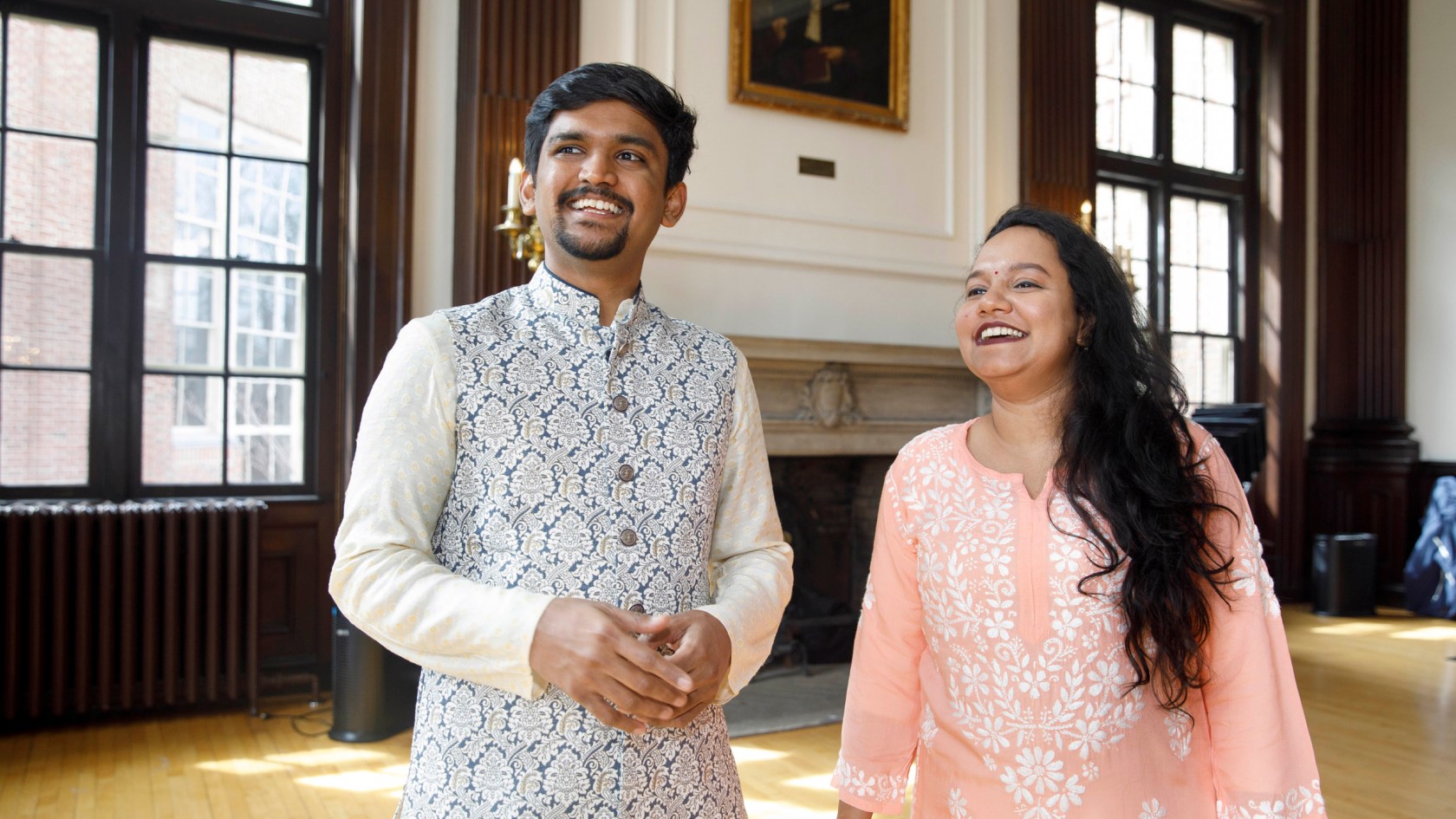 Headshot of Vyankatesh Kharage and Alria Monteiro standing together.