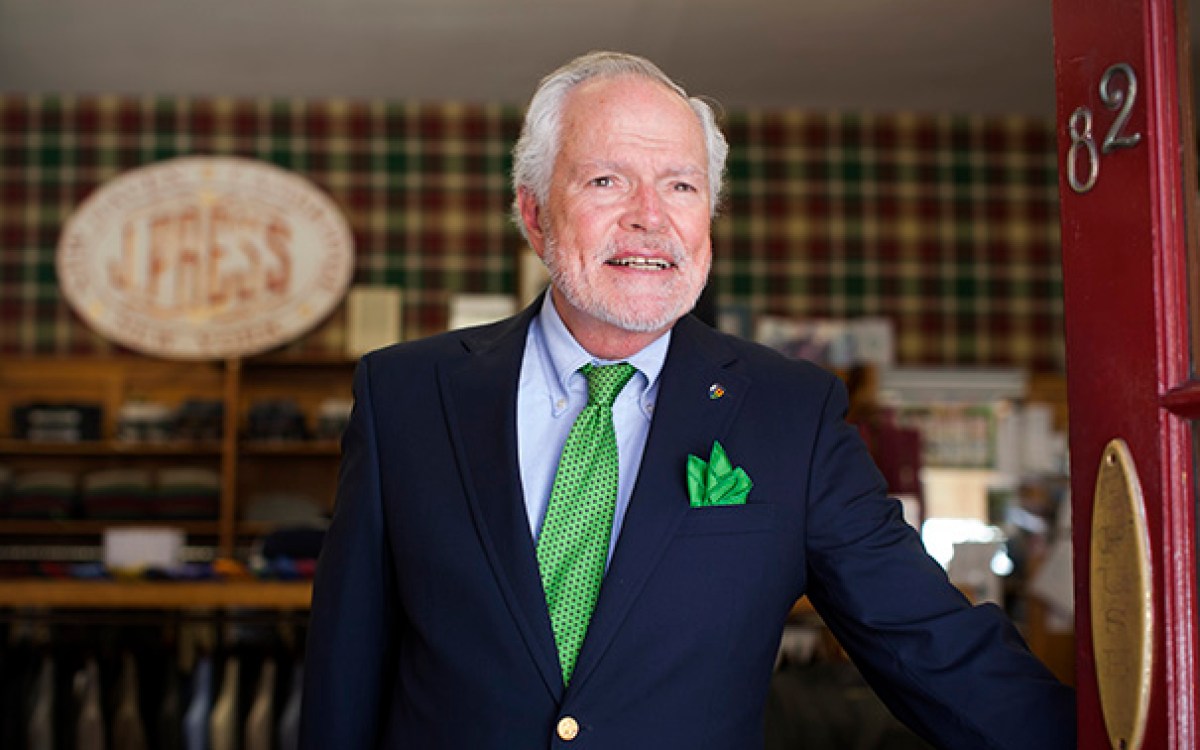 Denis Black is the general manager emeritus of J. Press Store in Harvard Square. He has been with the store since 1977 and in the clothing business for over 50 years. He is pictured by the shop entrance on Mt. Auburn Street. Stephanie Mitchell/Harvard Staff Photographer