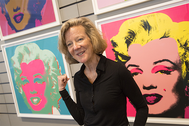 Curator Mary Schneider Enriquez with Andy Warhol silkscreen prints of Marilyn Monroe, at the Harvard Art Museums..Jon Chase/Harvard Staff Photographer.