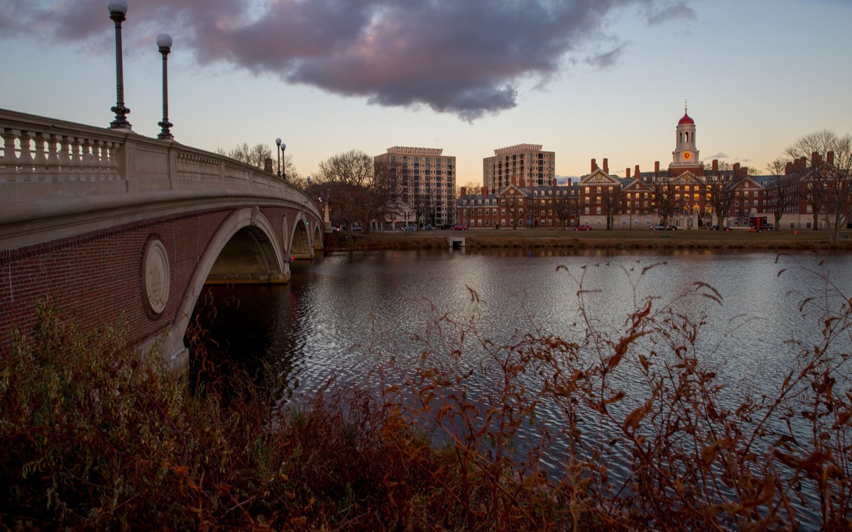 Views at dusk of the Charles River, the Weeks Footbridge,