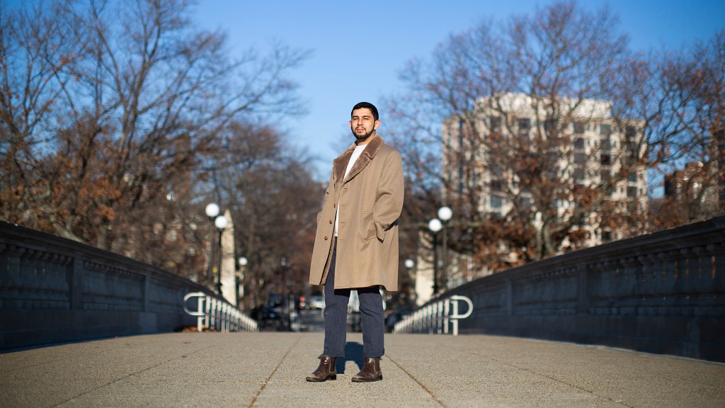 Ruben Reyes stands on the Weeks Bridge.