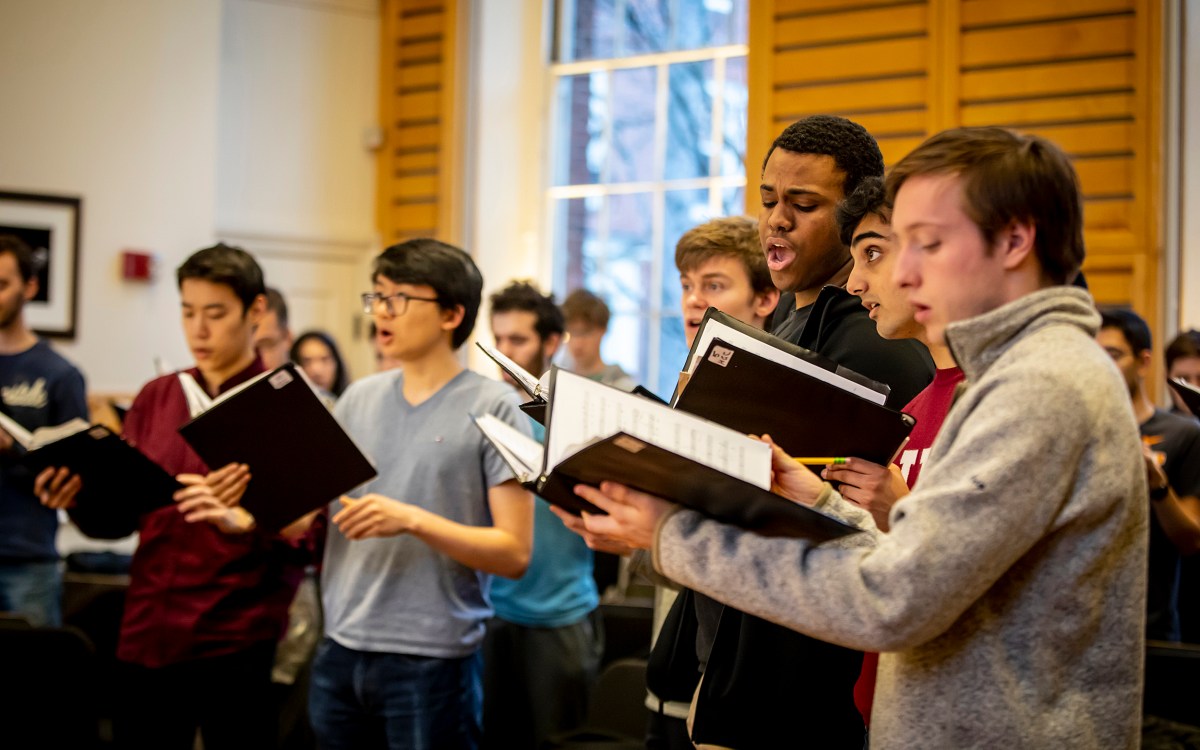 The Glee Club rehearses.