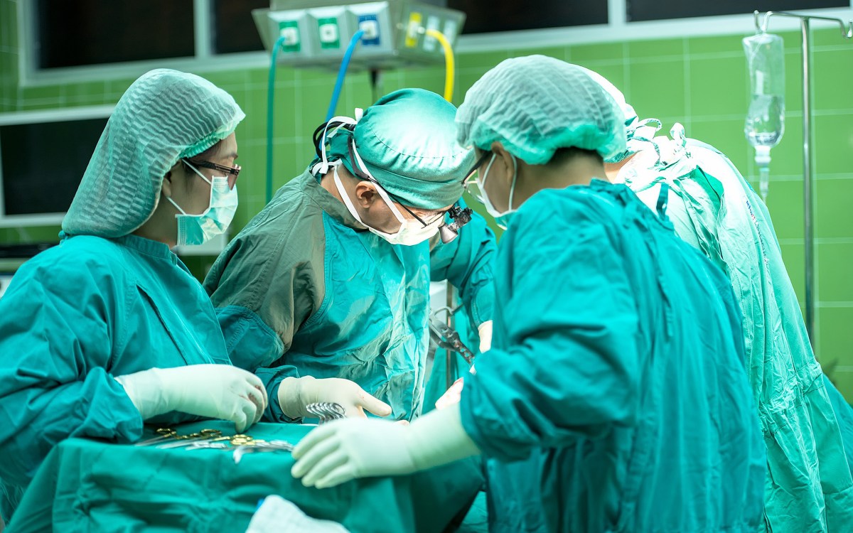 Surgeons performing an operation