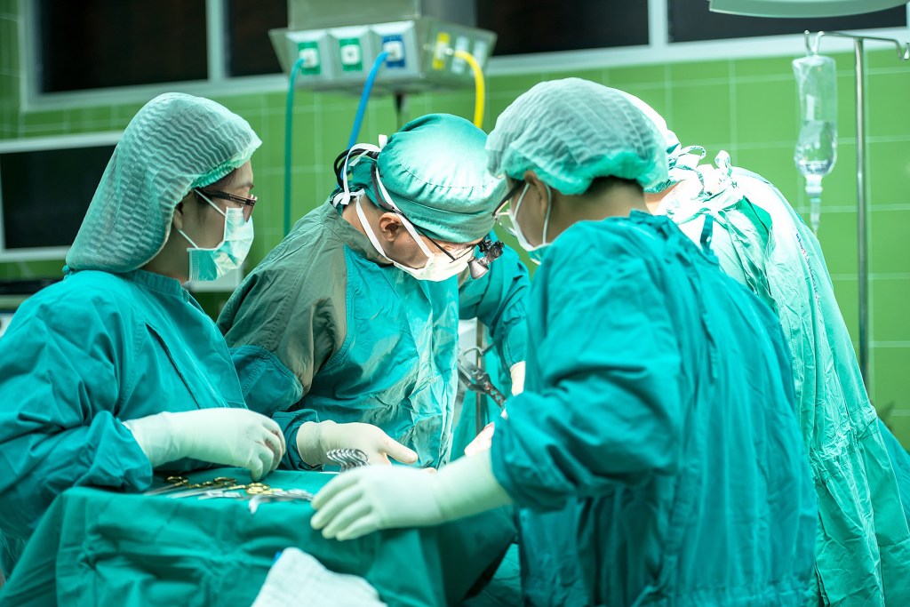 Surgeons performing an operation