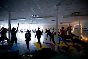 People doing yoga.