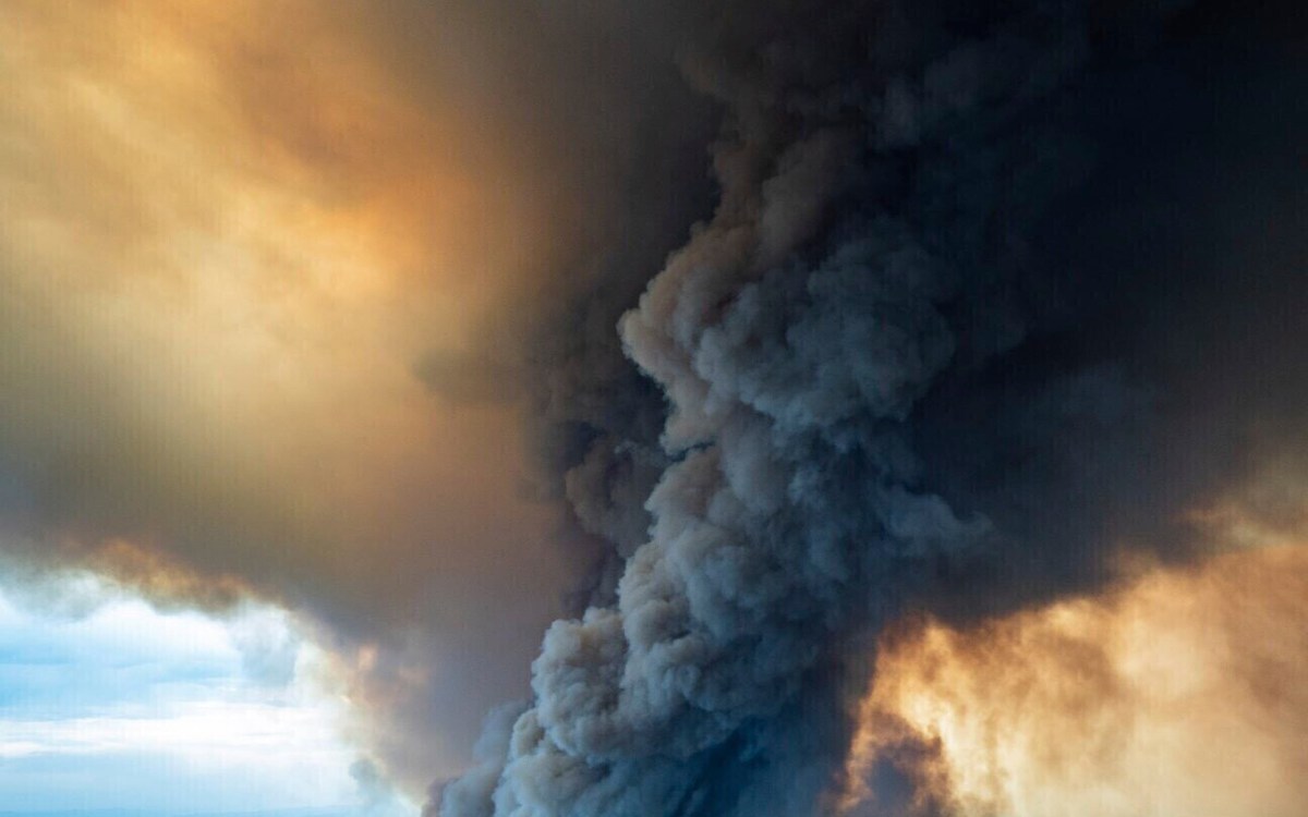 Aerial shot of massive plume of smoke rising from Australia wildfires.