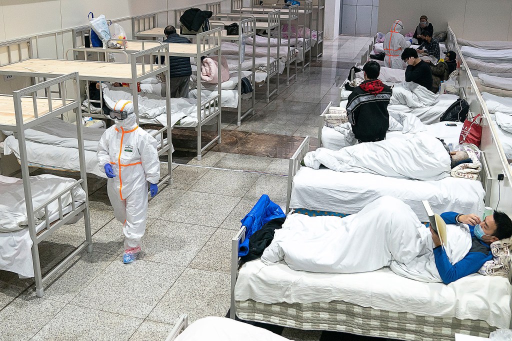 Patients in a makeshift hospital in China.