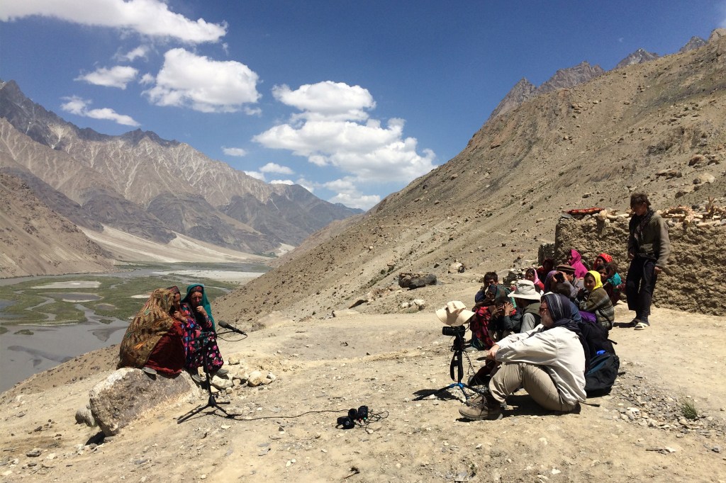 Richard Wolf and villagers recording Wakhi women singing “bulbulik.”