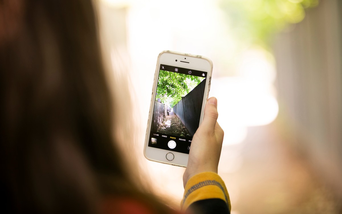 Person holding a smartphone.