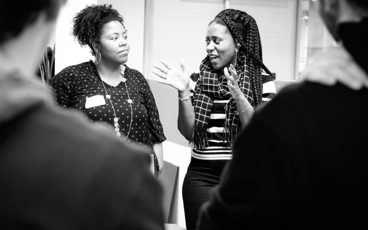 Women from the Studio speaking.