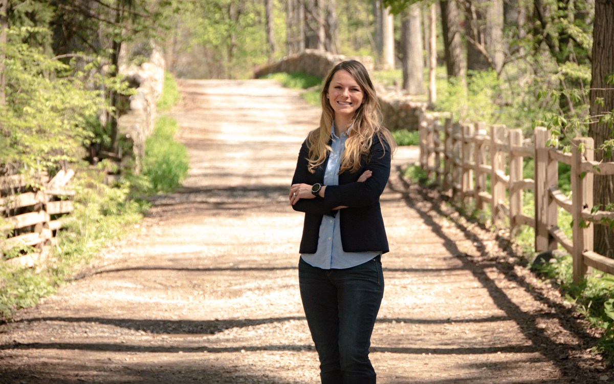 Kirstin Woody Scott on dirt road.