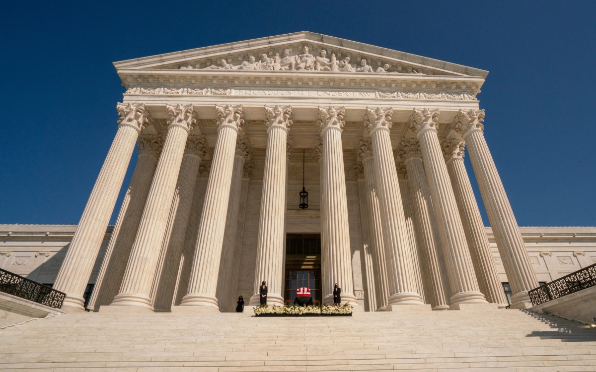 Ruth Bader Ginsburg casket at top of Supreme Court stairs.