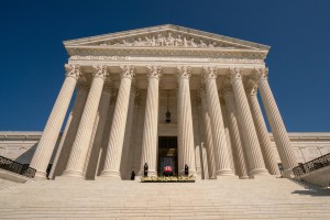 Ruth Bader Ginsburg casket at top of Supreme Court stairs.