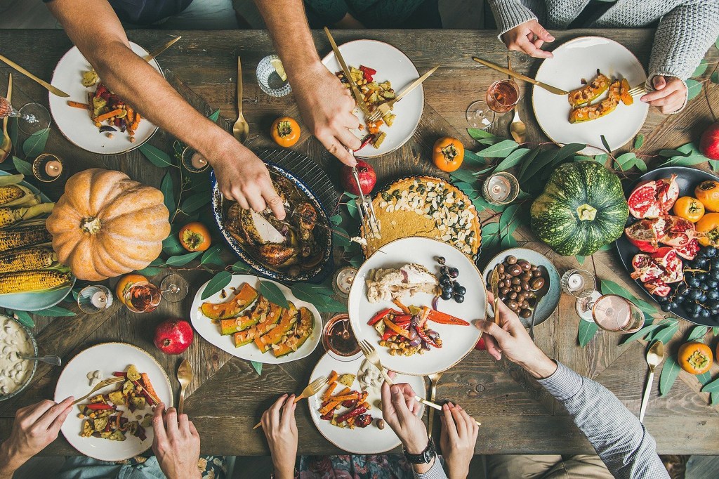 People at Thanksgiving table.