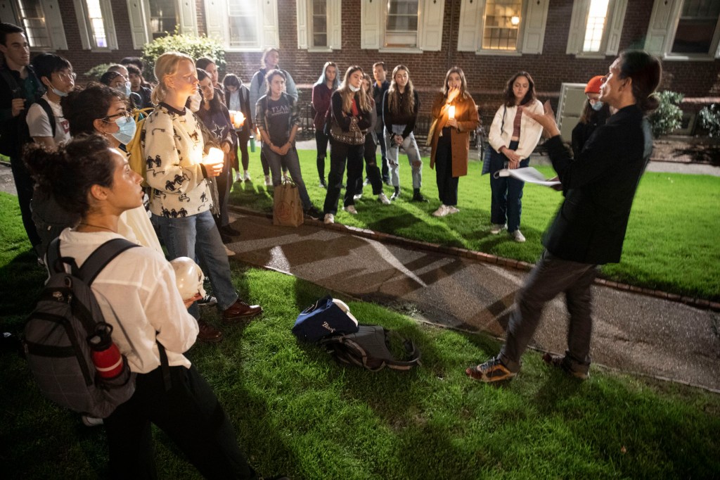 Supernatural Storytelling students meeting at night.