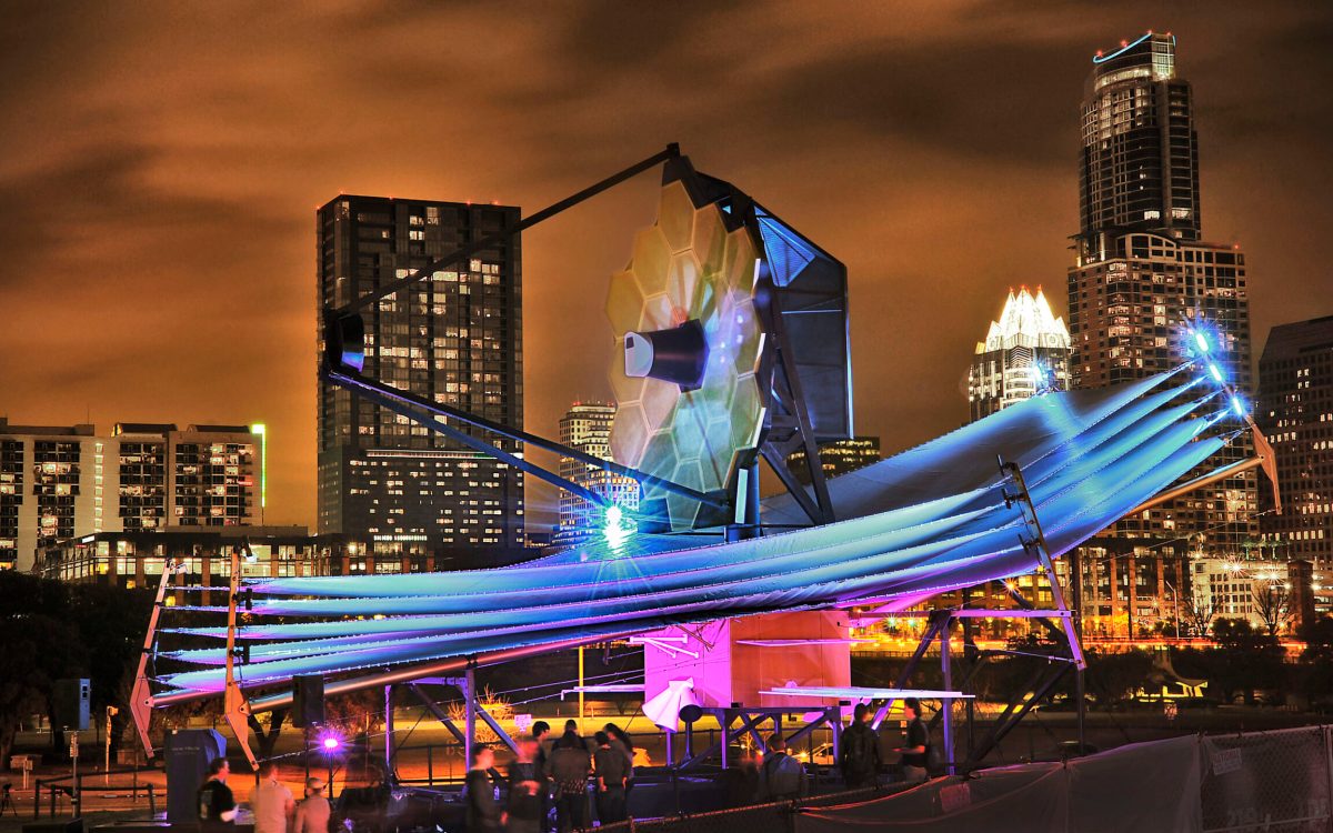 James Webb Space Telescope model at South by Southwest with Austin skyline in back.