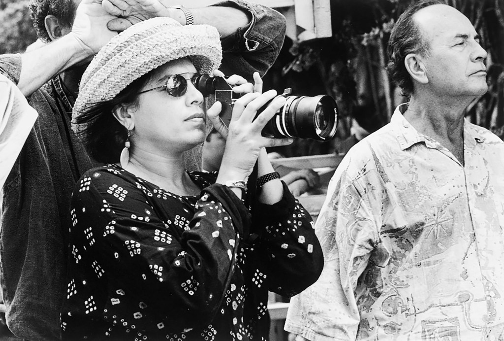 Mira Nair holds camera on set of "The Perez Family."