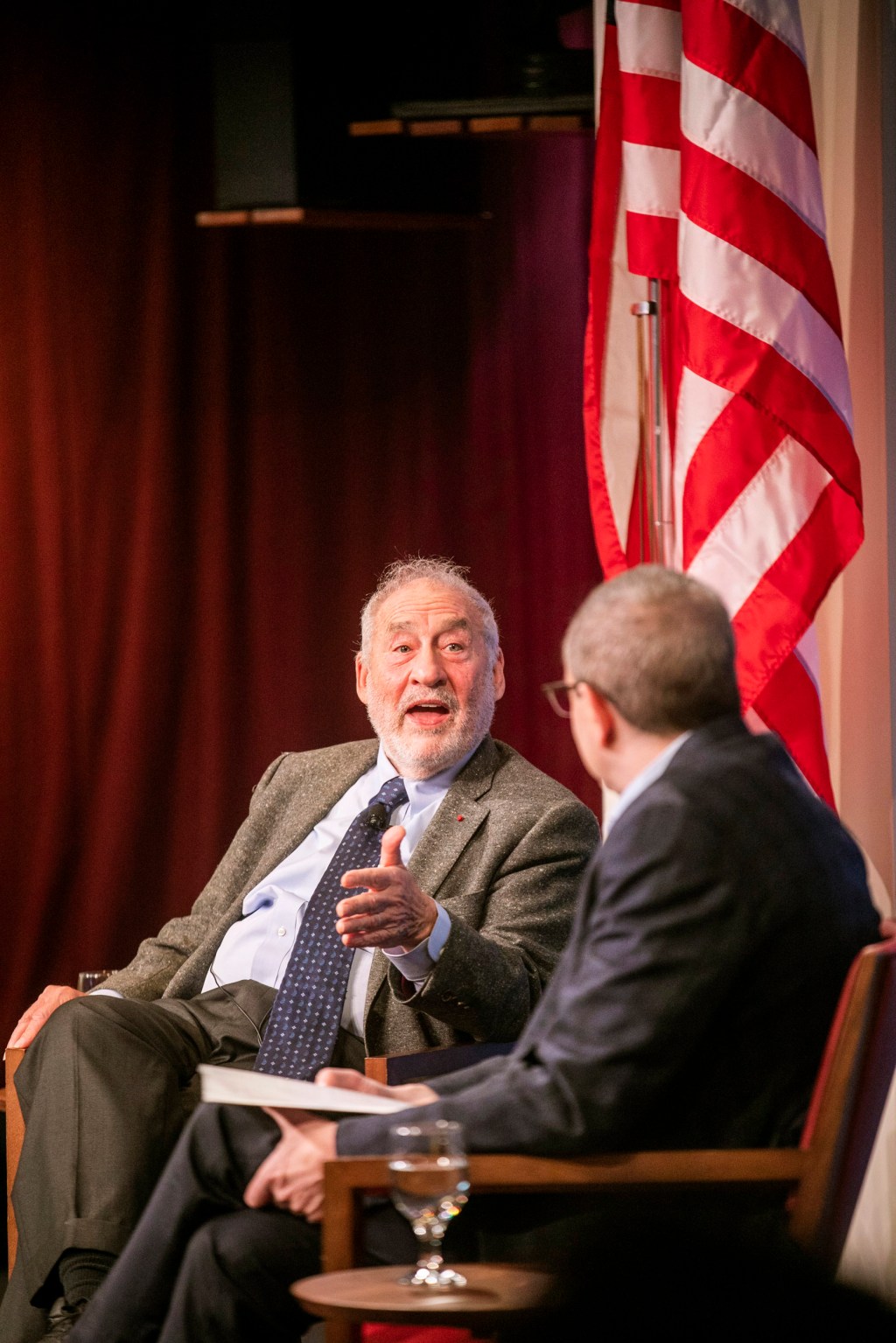 Nobel laureate economist Joseph Stiglitz, left, gives the 2022 Stone lecture on inequality with visiting HKS prof David Autor.