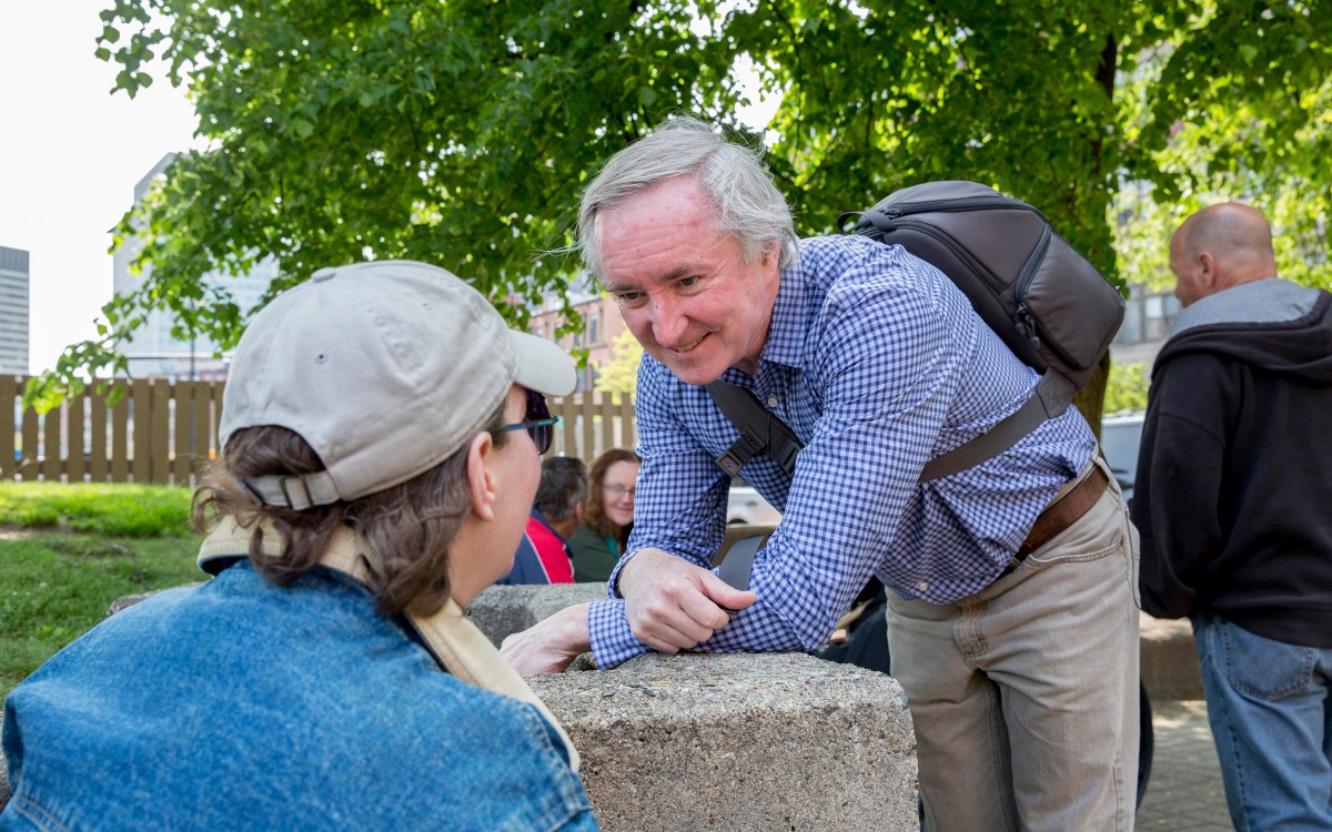 Jim O'Connell outside with a patient.