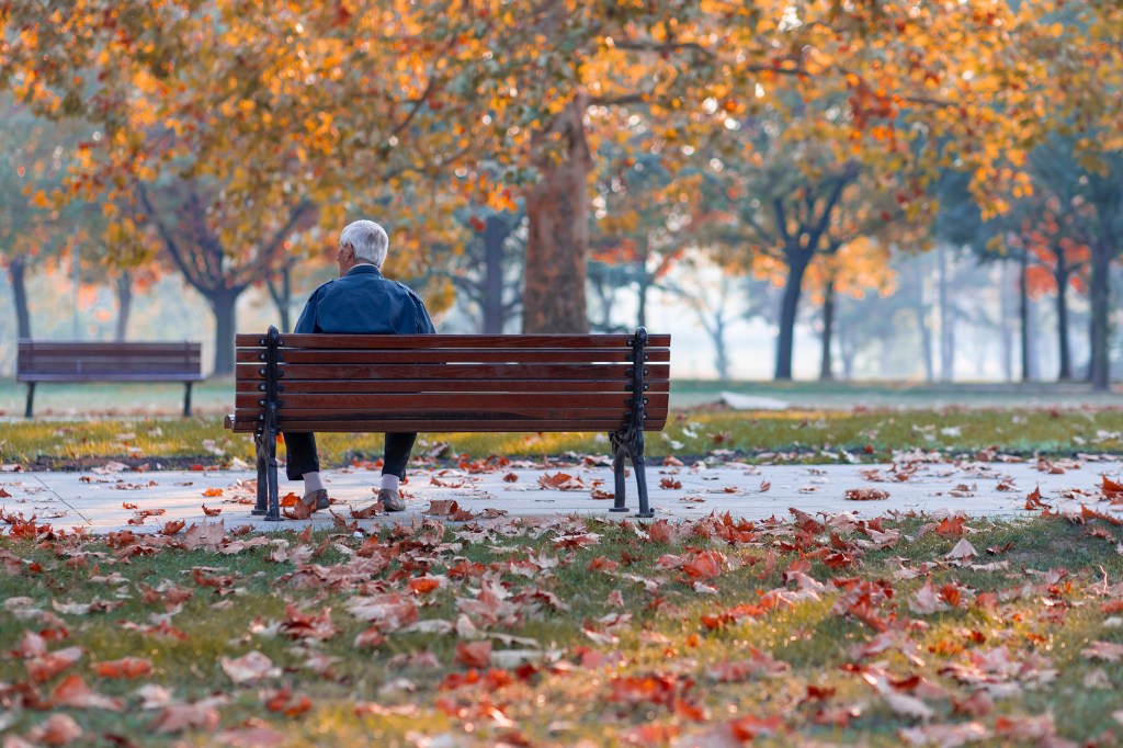 Lonely man on a bench.