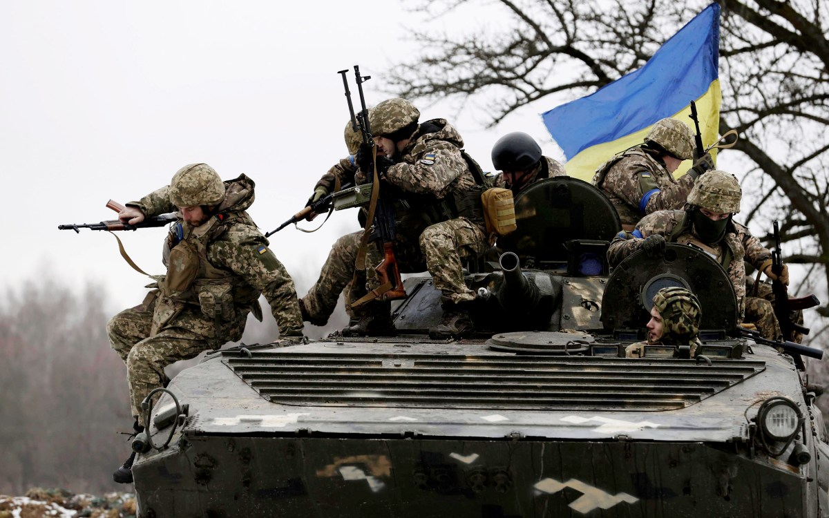 Ukrainian soldiers with a tank.