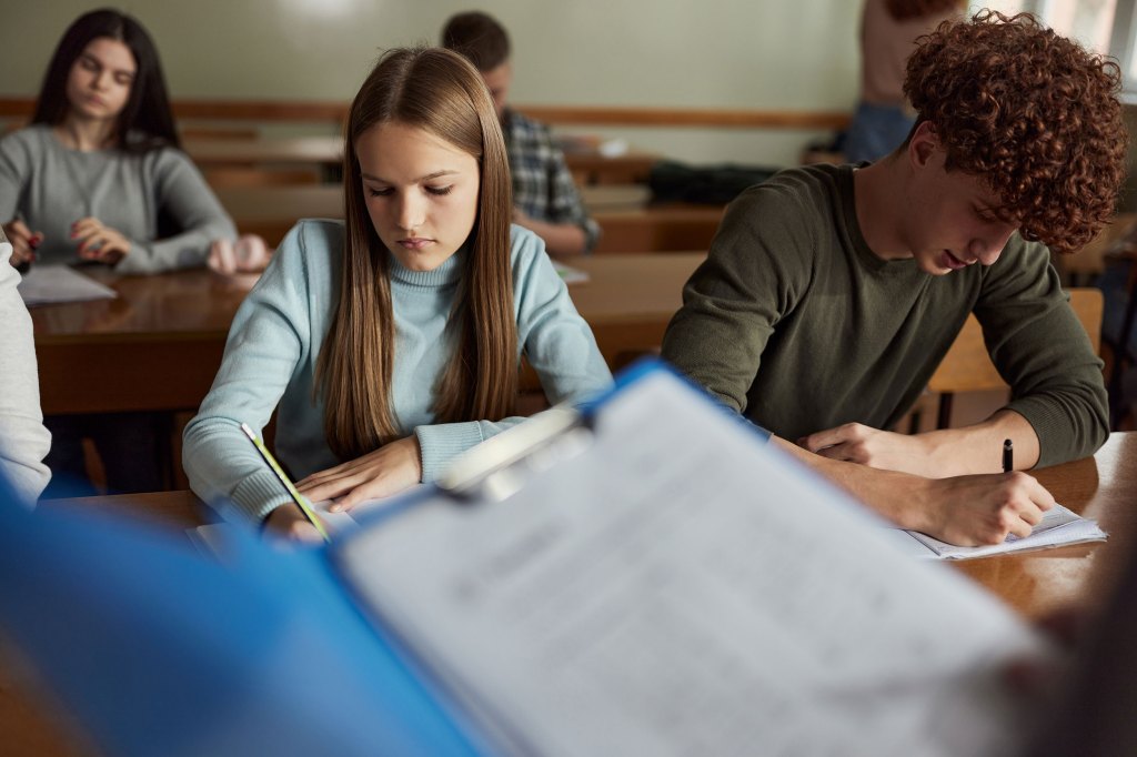 Teens in classroom.