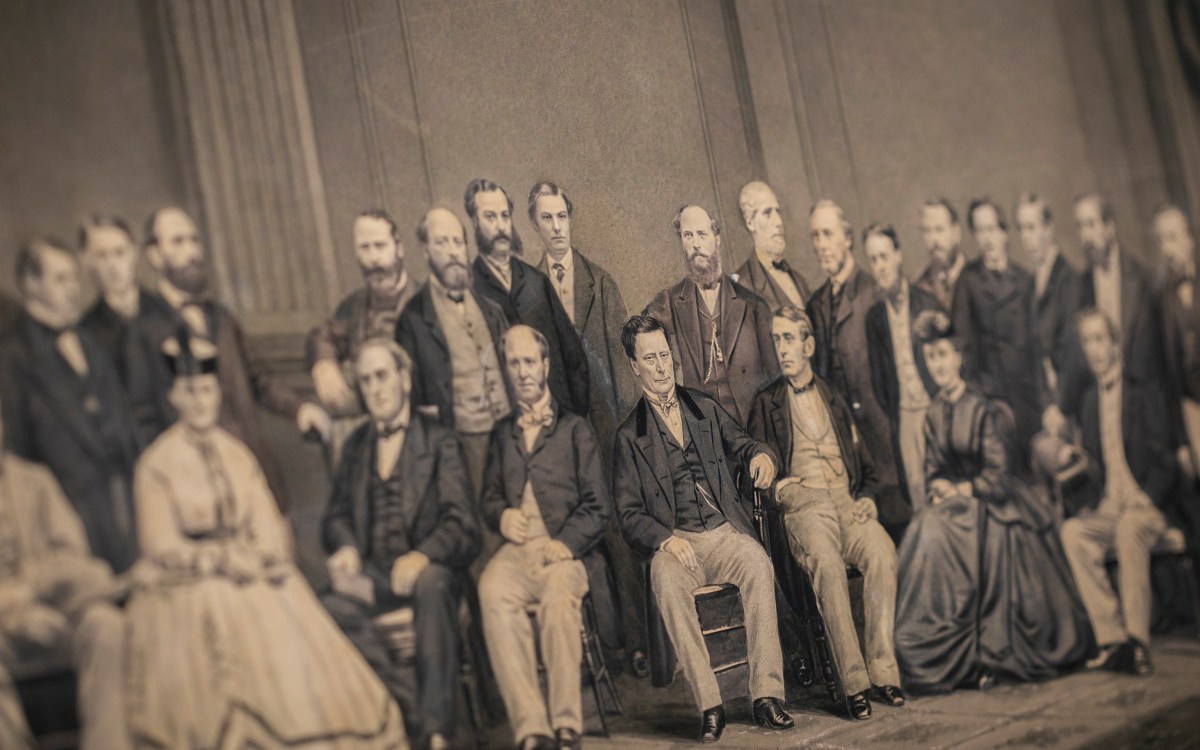 People in a group potrait in 1865 looking in different directions and not at the camera.