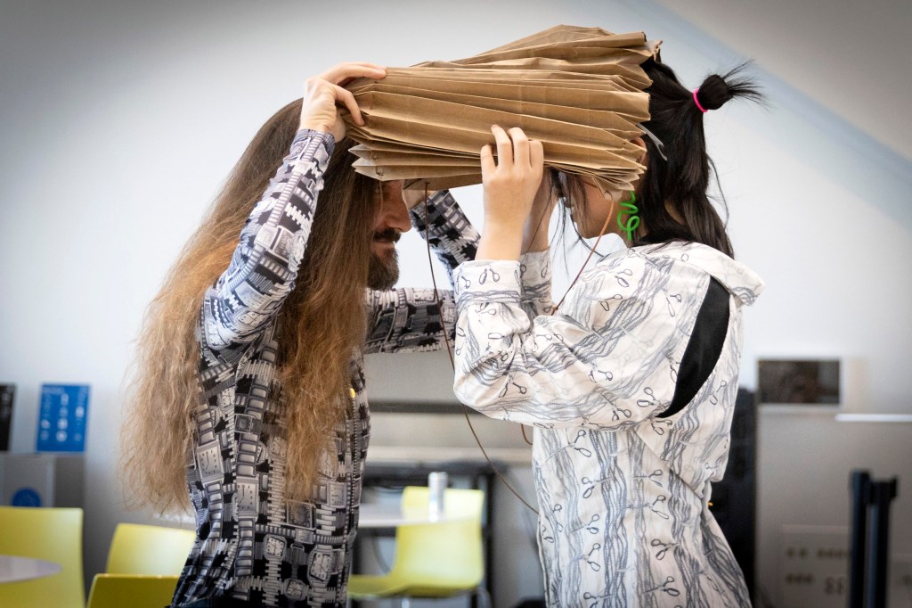 Two models pose during the fashion show.