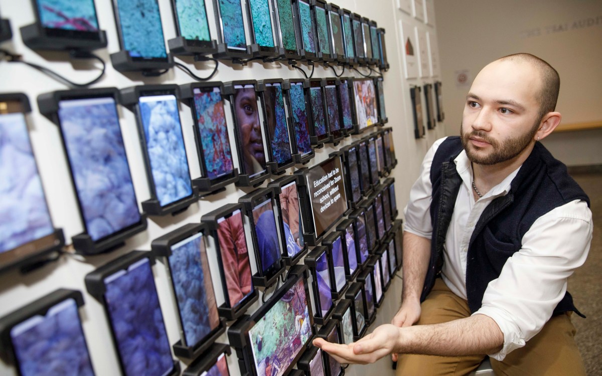 Wall of smart phones that stories were recorded on. as part o the exhibit.