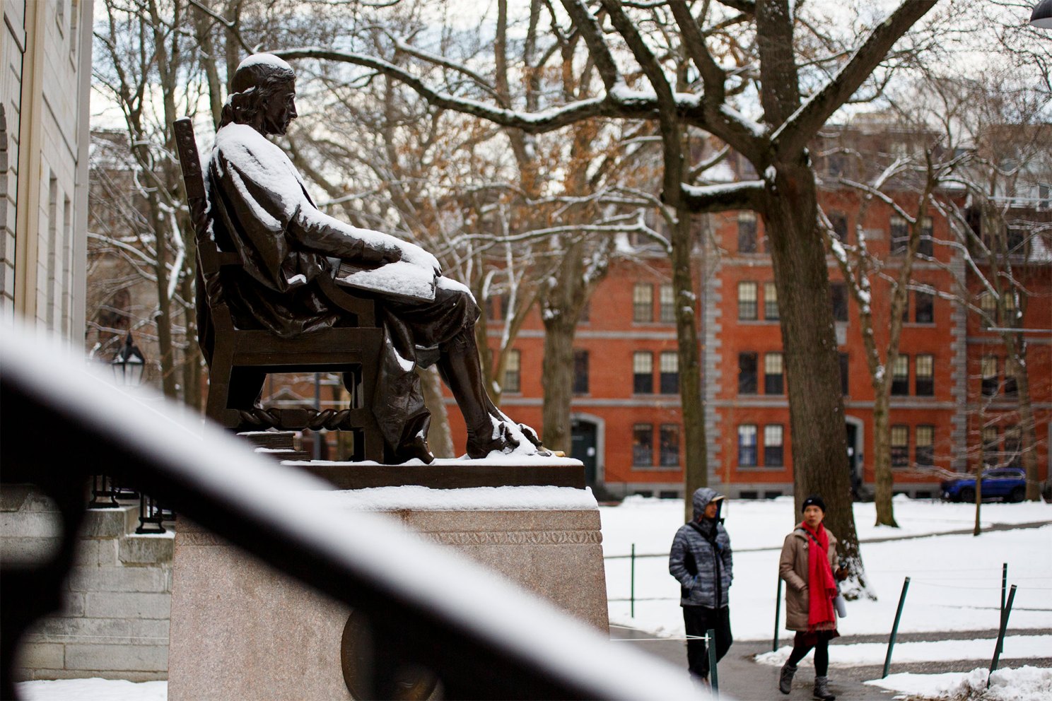 John Harvard Statue, covered in a fresh layer of snow.