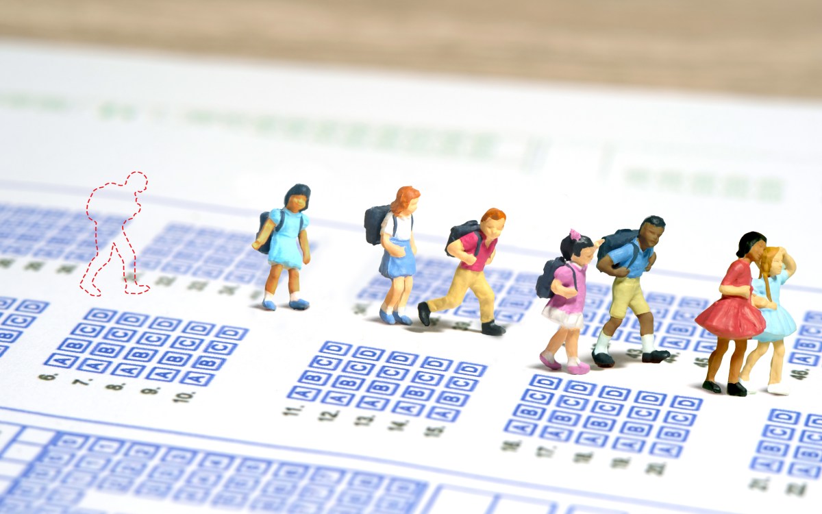 Illustration of a child left behind a group of schoolchildren on math and reading exams.