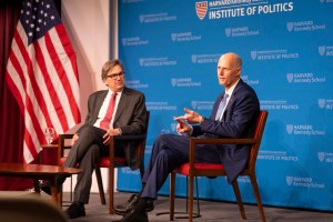 Jason Furman (left) and Rick Scott.