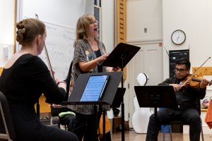 Krista River sings, backed by the Arneis Quartet, at Harvard's Mahindra Humanities Center.