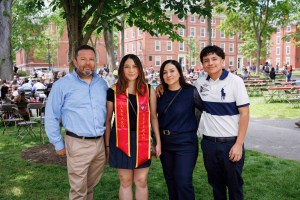 Ayleen Villarreal with family in Harvard Yard.