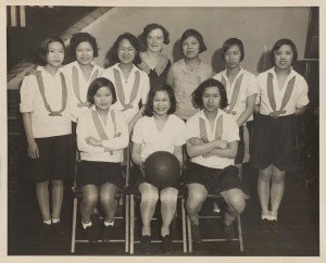 A black-and-white photograph of a girls basketball team