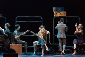 Passengers cast onstage.