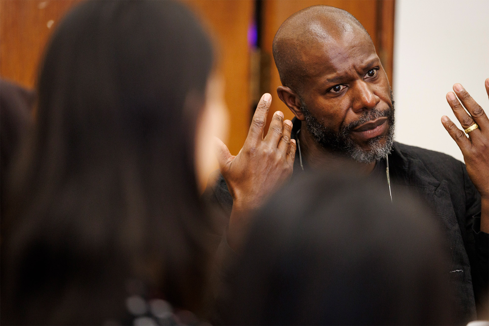 Steve McQueen (left) speaks at ArtsBites, an undergraduate luncheon and discussion series at the Office for the Arts. 