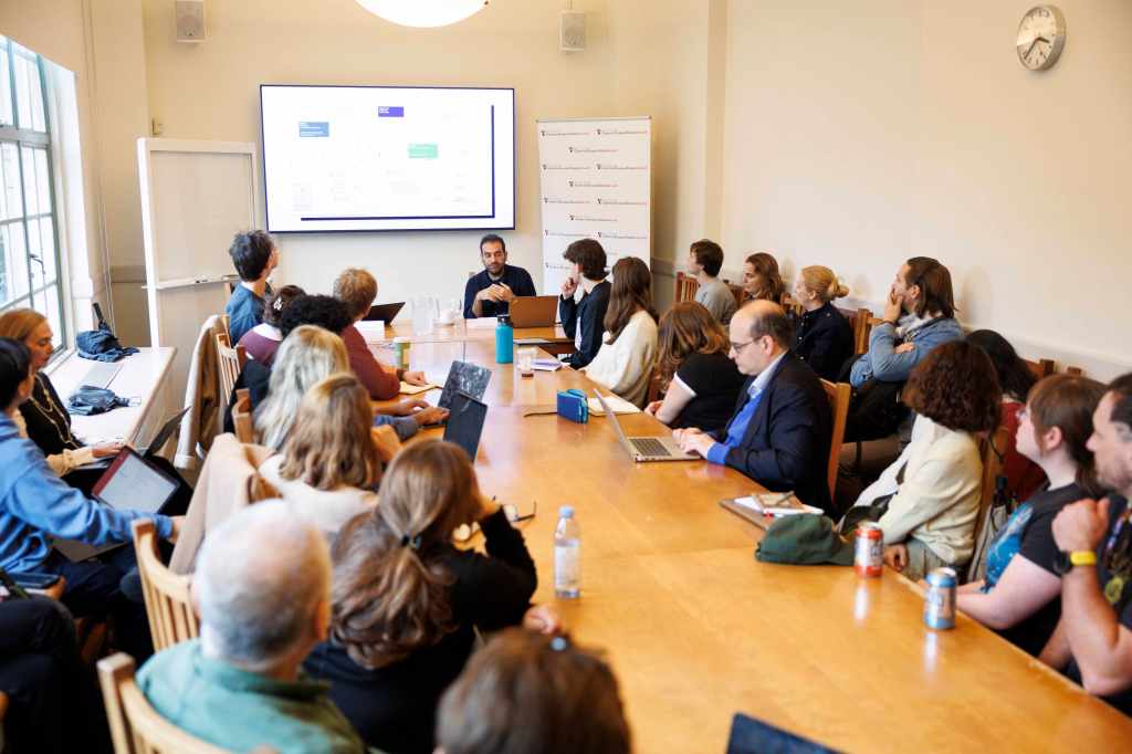 Attendees look on during Sotiris Sideris’s presentation.