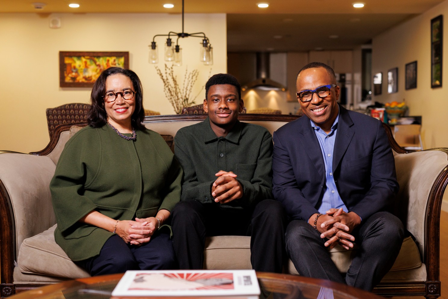 New Currier House Faculty Deans Nancy Hill and Rendall Howell, and their son, Theo Howell.