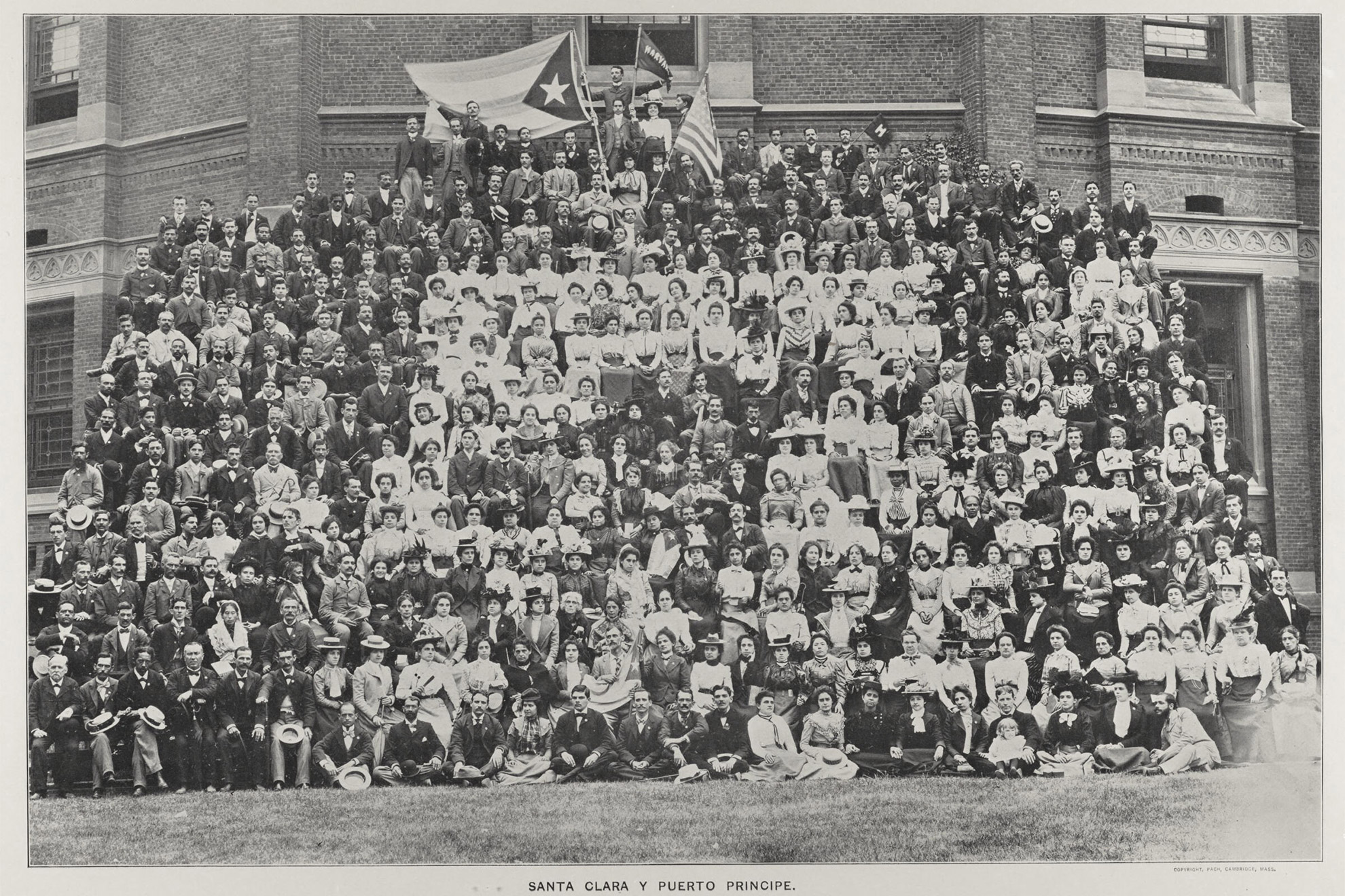Teachers, men and women ages 16 to 60, traveled to Massachusetts via U.S. Army warship and mugged for a group photo before Memorial Hall.