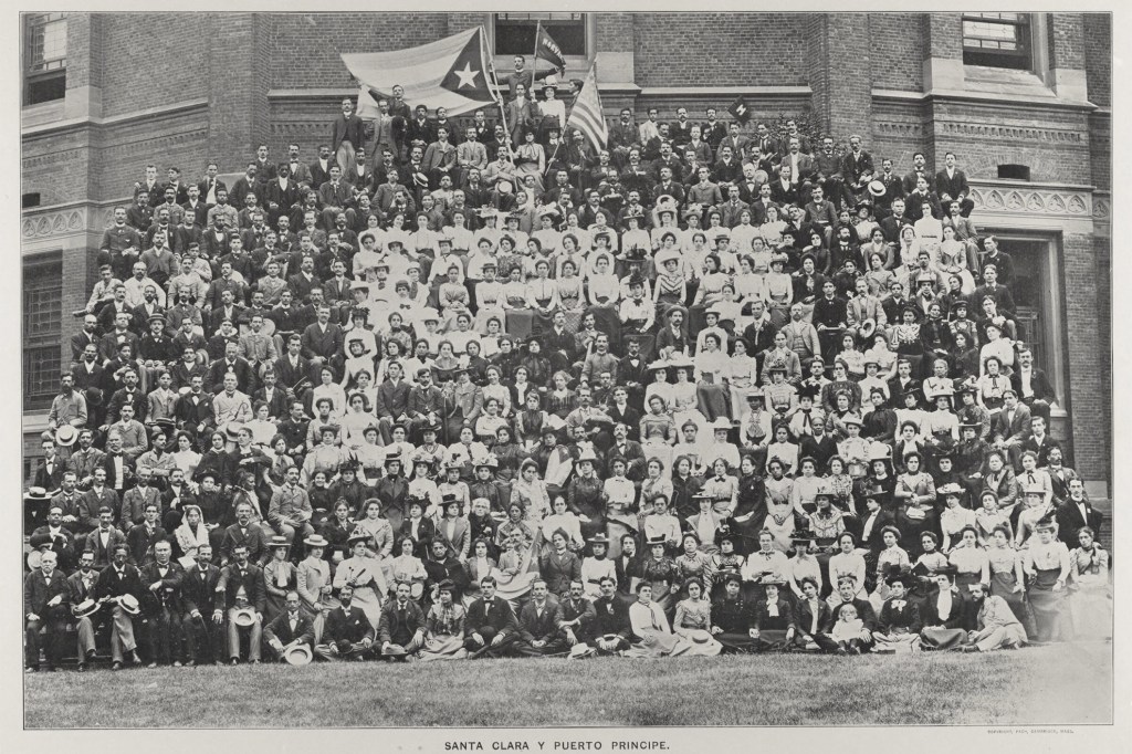 Teachers, men and women ages 16 to 60, traveled to Massachusetts via U.S. Army warship and mugged for a group photo before Memorial Hall.