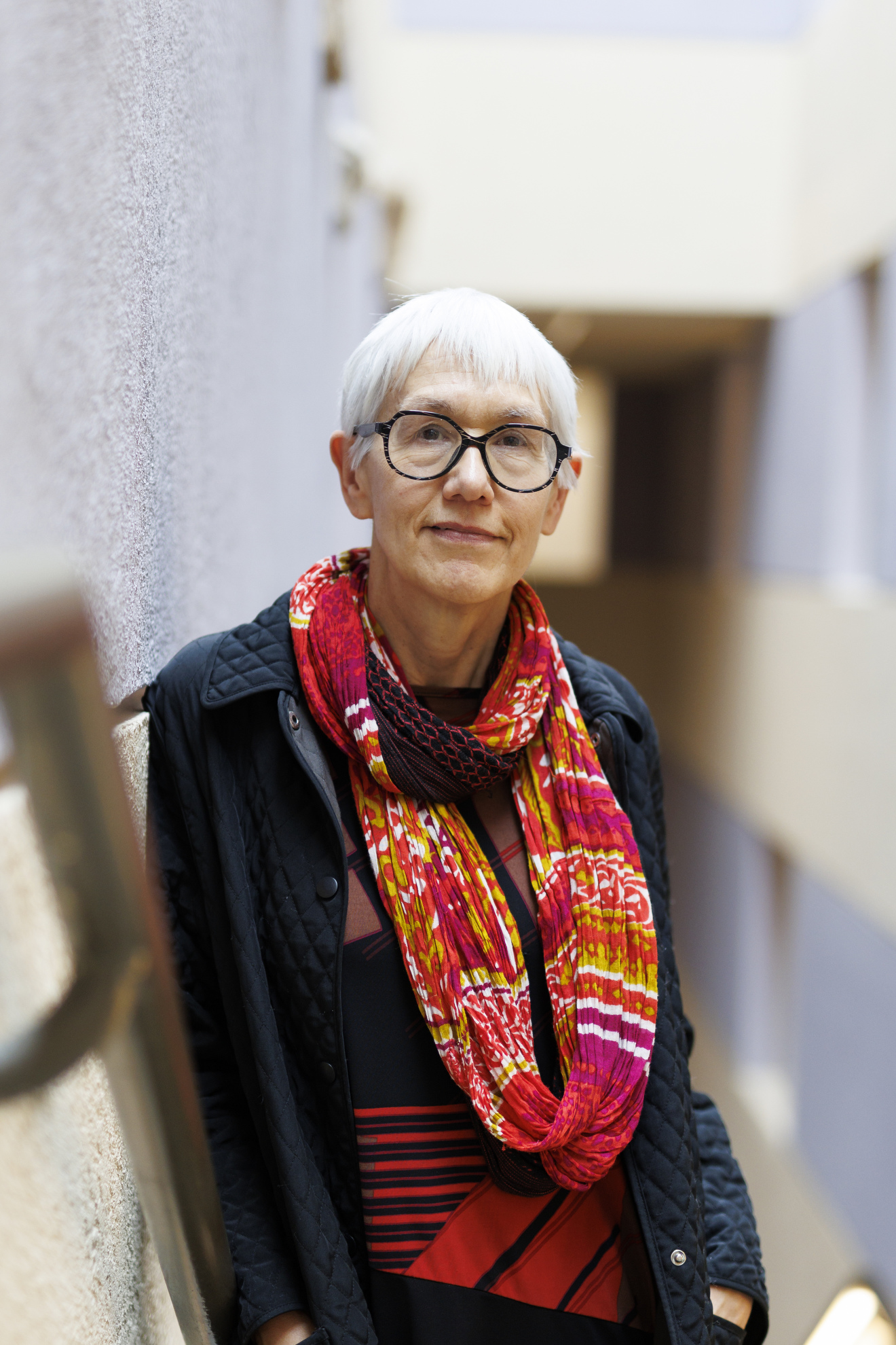 Ann Forsyth standing in a stairwell.