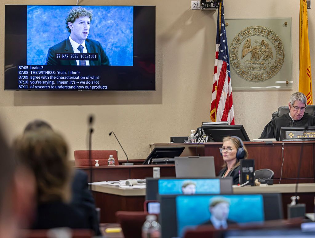 A trial room with a recording on Mark Zuckerberg playing