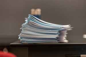 Stack of blue books.