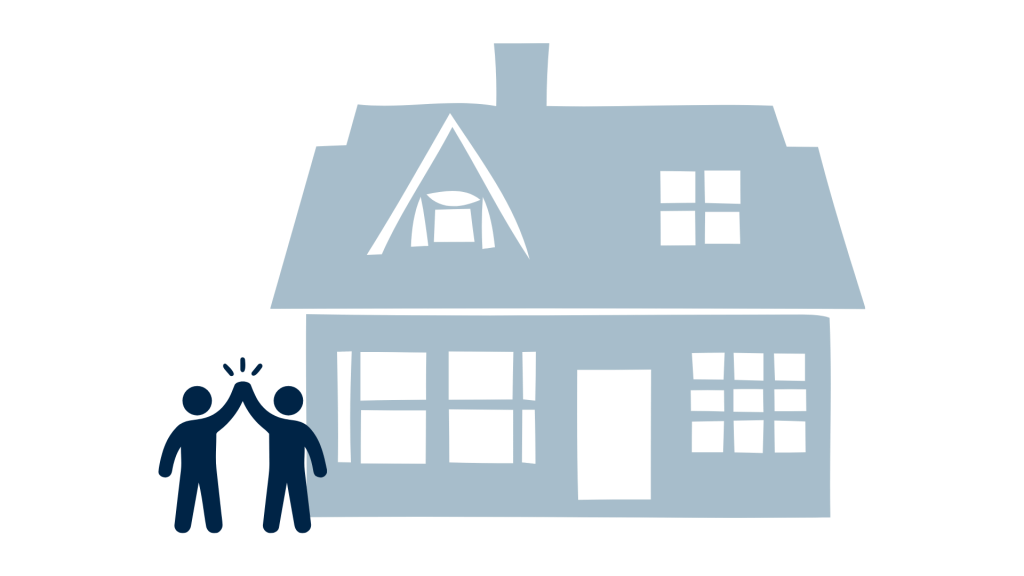 people celebrating in front of a home